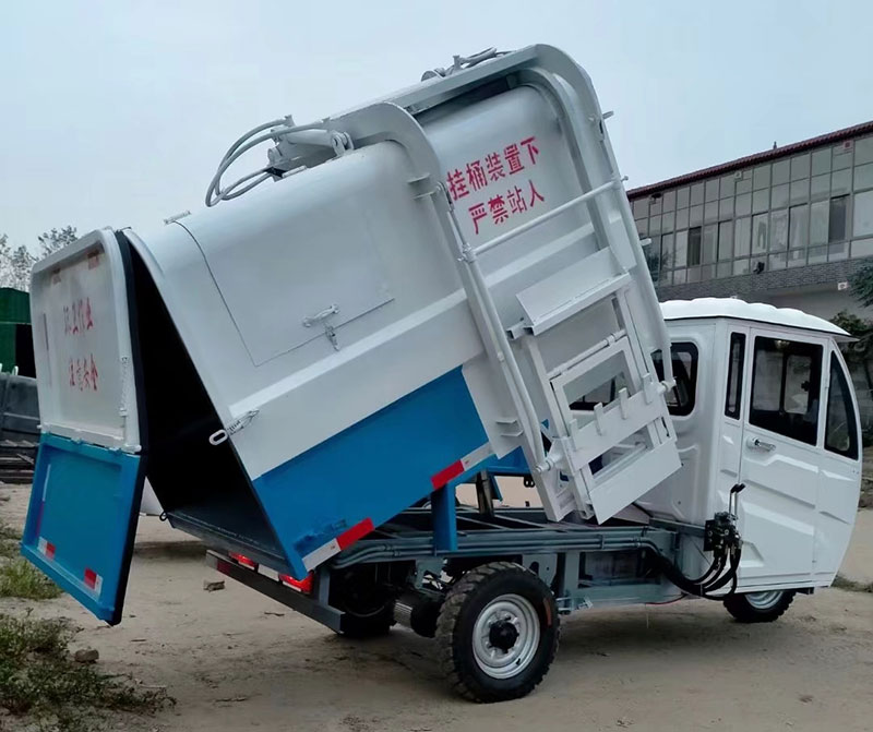 电动三轮侧翻挂桶清运车